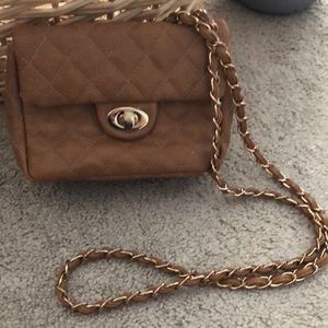 Cute Tan and gold chained bag